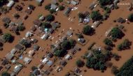 A satellite image shows houses submerged in floods caused by torrential rains unleashed by the remnants of Hurricane Ida, in Manville, New Jersey, U.S., September 2, 2021. Satellite image copyright 2021 Maxar Technologies/Handout via REUTERS