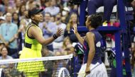 Leylah Fernandez of Canada, right, shakes hands with Naomi Osaka of Japan after a third round match on day five of the 2021 US Open tennis tournament. Jerry Lai-USA TODAY Sports