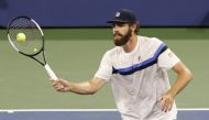 Reilly Opelka of the United States hits a volley against Nikoloz Basilashvili of Georgia (not pictured) on day six of the 2021 U.S. Open tennis tournament. Geoff Burke-USA TODAY Sports