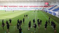 Qatar players in action during a practice session at the Stade de Luxembourg yesterday.