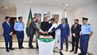 Pakistan Ambassador to Qatar H E Syed Ahsan Raza Shah with other officials during the celebration of Defence Day of Pakistan at the Embassy premises, yesterday.