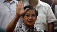 Senator Panfilo Lacson waves to reporters before the start of a news conference at the Senate headquarters in Pasay city, metro Manila March 28, 2011. REUTERS/Romeo Ranoco/File Photo