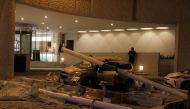 A car damaged during a quake is pictured at the Hotel Emporio in Acapulco, Mexico September 7, 2021. Picture taken September 7, 2021. REUTERS/Stringer