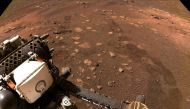 Wheel tread marks are left in the soil of Jezero Crater on Mars, as NASA's Mars rover Perseverance drives on Martian surface for the first time, in this March 4, 2021 image supplied to Reuters. Image taken March 4, 2021. NASA/JPL-Caltech/Handout via REUTE
