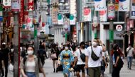 People walk in Shibuya shopping area, during a state of emergency amid the coronavirus disease (COVID-19) outbreak in Tokyo, Japan August 29, 2021. REUTERS/Androniki?Christodoulou

