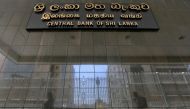 File photo: People walk past the main entrance of the Sri Lanka's Central Bank in Colombo, Sri Lanka March 24, 2017. Reuters/Dinuka Liyanawatte/File Photo