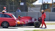Ferrari's Carlos Sainz Jr. after crashing during practice REUTERS/Jennifer Lorenzini