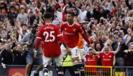 Manchester United's Cristiano Ronaldo celebrates scoring their second goal with Jadon Sancho REUTERS/Phil Noble 