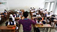 Students attend a class at the Udayan Uchcha Madhyamik Bidyalaya after the government has withdrawn restrictions on educational institutions after a decrease in the number of cases of coronavirus disease (COVID-19) in Dhaka, Bangladesh, September 12, 2021