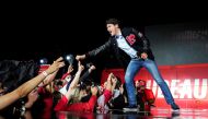FILE PHOTO: Canada's Liberal Prime Minister Justin Trudeau greets supporters at a drive-in rally during his election campaign tour in Oakville, Ontario Canada September 12, 2021. REUTERS/Carlos Osorio/File Photo
