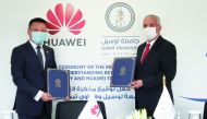 Professor Nitham Hindi (right), Lusail University Provost and Zhao Liang (left), CEO of Huawei Gulf North at MoU signing ceremony.