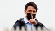 Canada's Prime Minister Justin Trudeau gestures to his staff after an election campaign stop in Richmond, British Columbia Canada September 14, 2021. REUTERS/Carlos Osorio
