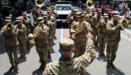 A Military bands perform during the 236th annual Military, Civic, and Firemen's Parade as part of 4th of July celebrations in Bristol, Rhode Island, U.S., July 5, 2021. REUTERS/Quinn Glabicki