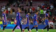  FC Barcelona's Gerard Pique and teammates look dejected after the match REUTERS/Albert Gea 
