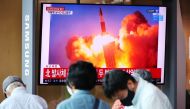 People watch a TV broadcasting file footage of a news report on North Korea firing missiles off its east coast, in Seoul, South Korea, September 15, 2021. Reuters/Kim Hong-Ji
