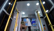 A resident receives a dose of a vaccine against the coronavirus disease (COVID-19) inside the 