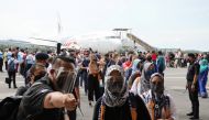 Tourists arrive at the airport as Langkawi reopens to domestic tourists, amid the coronavirus disease (COVID-19) pandemic, in Malaysia September 16, 2021. REUTERS/Lim Huey Teng