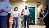 Canada's Liberal Prime Minister Justin Trudeau and his wife Sophie Gregoire wait a polling station to vote in the federal election in the Papineau riding of Montreal, Quebec, Canada September 20, 2021. REUTERS/Carlos Osorio
