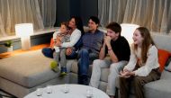 Canada's Liberal Prime Minister Justin Trudeau, accompanied by his wife Sophie Gregoire and his children Ella-Grace, Xavier and Hadrien watch the election coverage on TV, in Montreal, Quebec, Canada, September 20, 2021. Reuters/Carlos Osorio