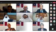 Qatar Chamber (QC) Board Member Dr. Mohamed Jawhar Al Mohamed and Malaysia-Qatar Business Council Chairman Mohamed Razeek Hussain, with other officials, during the virtual Qatar-Malaysian Business Council meeting hosted by the QC, yesterday. 
