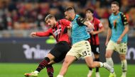 AC Milan's Theo Hernandez in action with Venezia's Domen Crnigoj REUTERS/Daniele Mascolo

