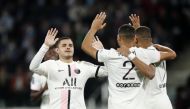 Paris St Germain's Achraf Hakimi celebrates scoring their first goal with teammates REUTERS/Benoit Tessier
