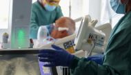 Hospital staff do an x-ray of the lung of a patient suffering from the coronavirus disease (COVID-19) at Hospital del Mar, where an additional ward has been opened to deal with an increase in coronavirus patients in Barcelona, Spain July 15, 2021. REUTERS