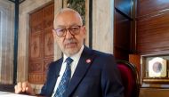 FILE PHOTO: Parliament Speaker Rached Ghannouchi, head of the moderate Islamist Ennahda, poses during an interview with Reuters in his office, in Tunis, Tunisia, March 9, 2021. Picture taken March 9, 2021. REUTERS/Jihed Abidellaoui