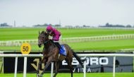 Ruling, with jockey Shane Crosse in the saddle, reaching the finish line. Pic: Racing Post