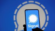 The Signal messaging app logo is seen on a smartphone, in front of the same displayed same logo, in this illustration taken, January 13, 2021. REUTERS/Dado Ruvic
