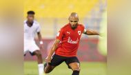 Al Rayyan's Yacine Ibrahim shoots to score their second goal.