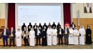 Qatar University President Dr. Hassan Rashid Al Derham with university's faculty, staff and students who won annual excellence awards.  