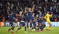 Paris St Germain's Kylian Mbappe with teammates celebrate after the match REUTERS/Gonzalo Fuentes
