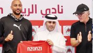 Al Rayyan President Sheikh Ali bin Saud Al Thani (centre), new signing Steven Nzonzi (left) and coach Laurent Blanc during the official unveiling of the French star yesterday.