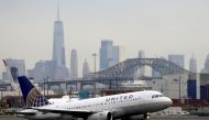 FILE PHOTO: A United Airlines passenger jet takes off with New York City as a backdrop, at Newark Liberty International Airport, New Jersey, U.S. December 6, 2019. REUTERS/Chris Helgren/File Photo/File Photo
