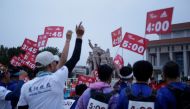 Staff members gather at Tiananmen Square before the start of the annual Beijing Marathon in Beijing, China November 3, 2019. REUTERS/Jason Lee