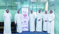 Officials from the Ministry of Justice (MoJ) and Qatar Financial Centre (QFC) during the opening of the new MoJ office at the QFC, in Doha, recently.