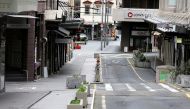 New Zealand will phase out a COVID-19 lockdown in Auckland that led to a largely deserted city when enacted in August. Picture taken August 26, 2021. REUTERS/Fiona Goodall/File Photo