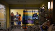Doctors discuss the treatment of Adrian James, 2, who tested positive for the coronavirus disease (COVID-19), at SSM Health Cardinal Glennon Children's Hospital in St. Louis, Missouri, U.S., October 5, 2021. Reuters/Callaghan O'Hare