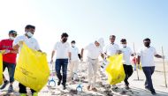 Ambassador of India to Qatar Dr. Deepak Mittal with ICC members during beach cleaning.