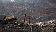 File photo: Workers drill at an open cast coal field at Dhanbad district in the eastern Indian state of Jharkhand September 18, 2012. Reuters/Ahmad Masood/File Photo