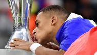 France's Kylian Mbappe kisses the Nations League trophy after the match REUTERS/Alberto Lingria
