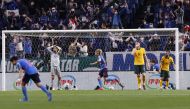 Australia's Aziz Behich looks dejected after scoring an own goal and Japan's second REUTERS/Kim Kyung-Hoon
