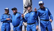 Chris Boshuizen, the co-founder of satellite company Planet Labs and a former space mission architect for NASA and Glen de Vries, the co-founder of Medidata Solutions, a life science company gesture as Star Trek actor William Shatner speaks to the news me