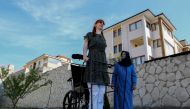 World's tallest woman Rumeysa Gelgi poses with her mother Safiye Gelgi during a news conference outside their home in Safranbolu, Karabuk province, Turkey, October 14, 2021. REUTERS/Cagla Gurdogan
