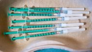 Pharmacist Susanne Wohlgemuth prepares Pfizer/BioNTech COVID-19 vaccinations at the Haus an der Linde nursing home in Lichtentanne, Saxony, Germany December 27, 2020, the day when the country starts its vaccination programme. Hendrik Schmidt/Pool via Reut