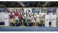 The Podium winners of the Medium Tour Team event with officials during the presentation ceremony on the opening day of the first leg of the Longines Hathab Qatar Equestrian Tour 