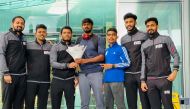 New Vision Badminton Sport (NVBS) coaching team welcoming Malaysian ex-junior International badminton player Roobenraj Velatudham (centre) at Hamad International Airport. 