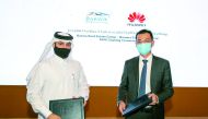 Yousuf Ahmad Al Binali (left), Group Chief of Corporate Operations at  Barwa Real Estate Group, and Alex Zhang, Managing Director of Huawei Enterprise Business Group in the North Gulf Region during the agreement signing ceremony on the sidelines of Citysc