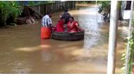 Bride and groom float to a temple in a cooking vessel on a flooded road for their wedding ceremony in this screengrab taken from video, in Alappuzha, Kerala, India, October 18, 2021. REUTERS TV/via REUTERS